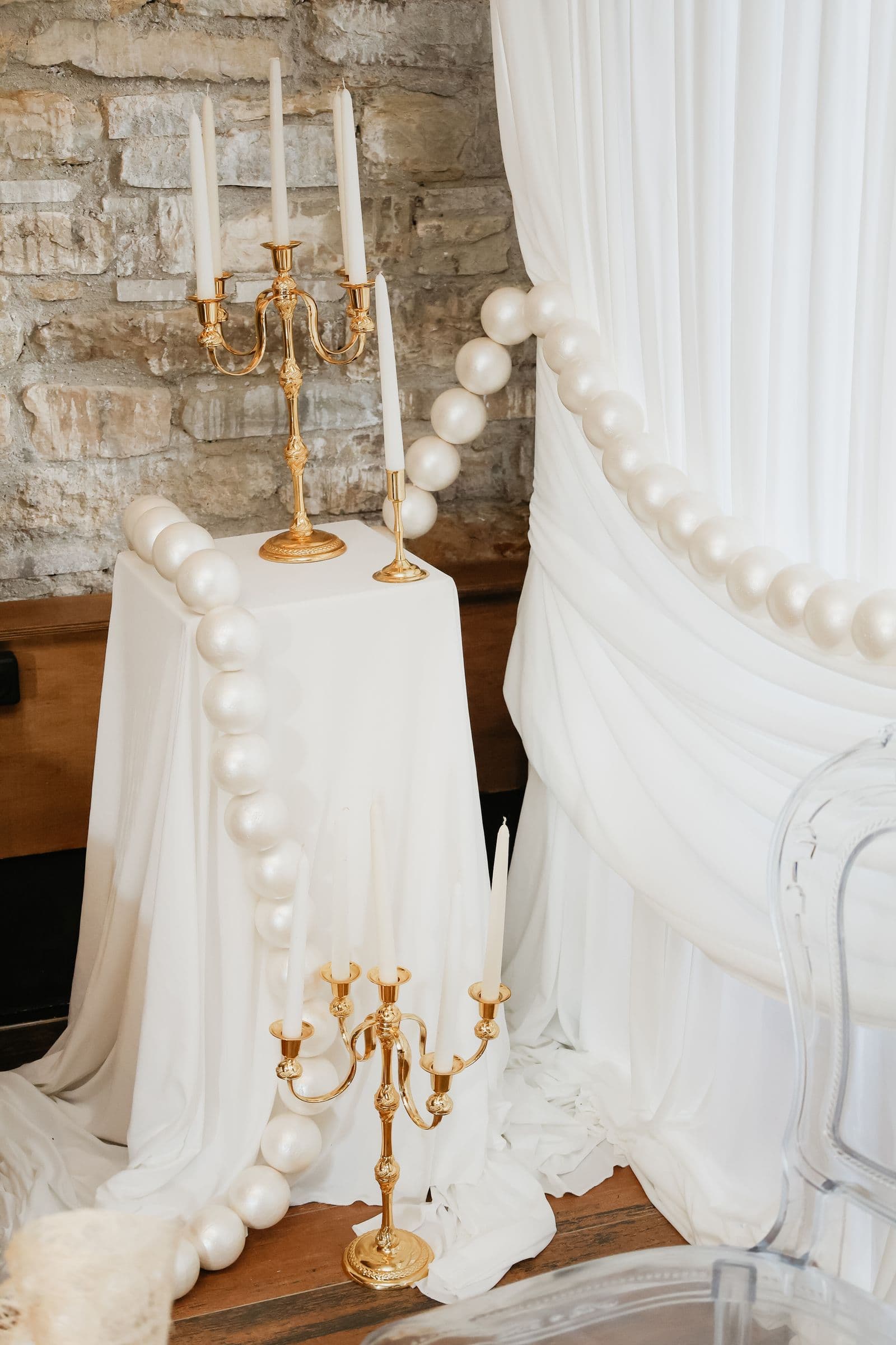 Wedding draping inspiration with candles and fabric